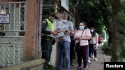 En fotos: Los colombianos votan para elegir un nuevo presidente.