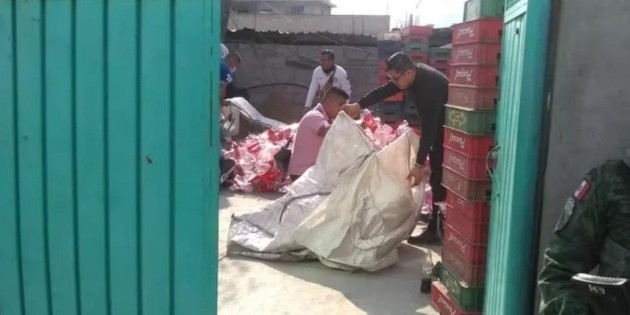  Hallan nueva fábrica de Coca Cola 'pirata' y detienen a 15 en el Estado de México