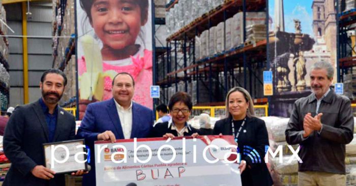  Entrega BUAP al Banco de Alimentos Cáritas Puebla 9 mil 450 kilos de arroz y frijol donados