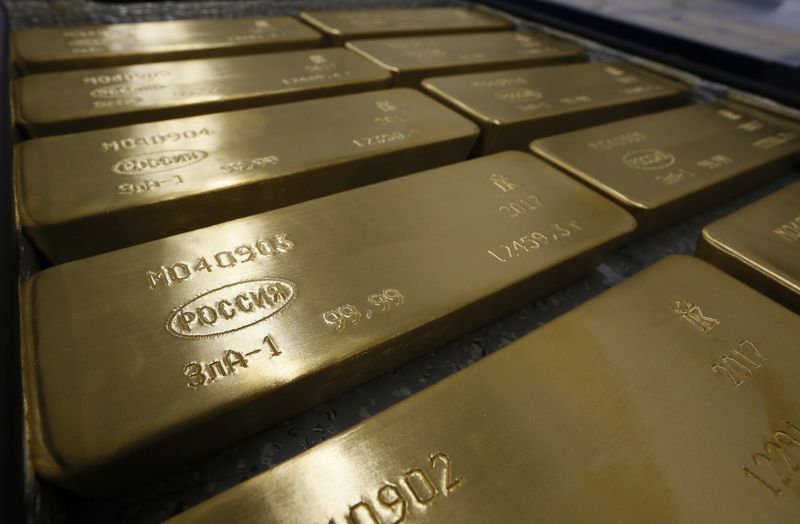  El oro cae a mínimos de una semana por estancamiento de compras de refugio seguro